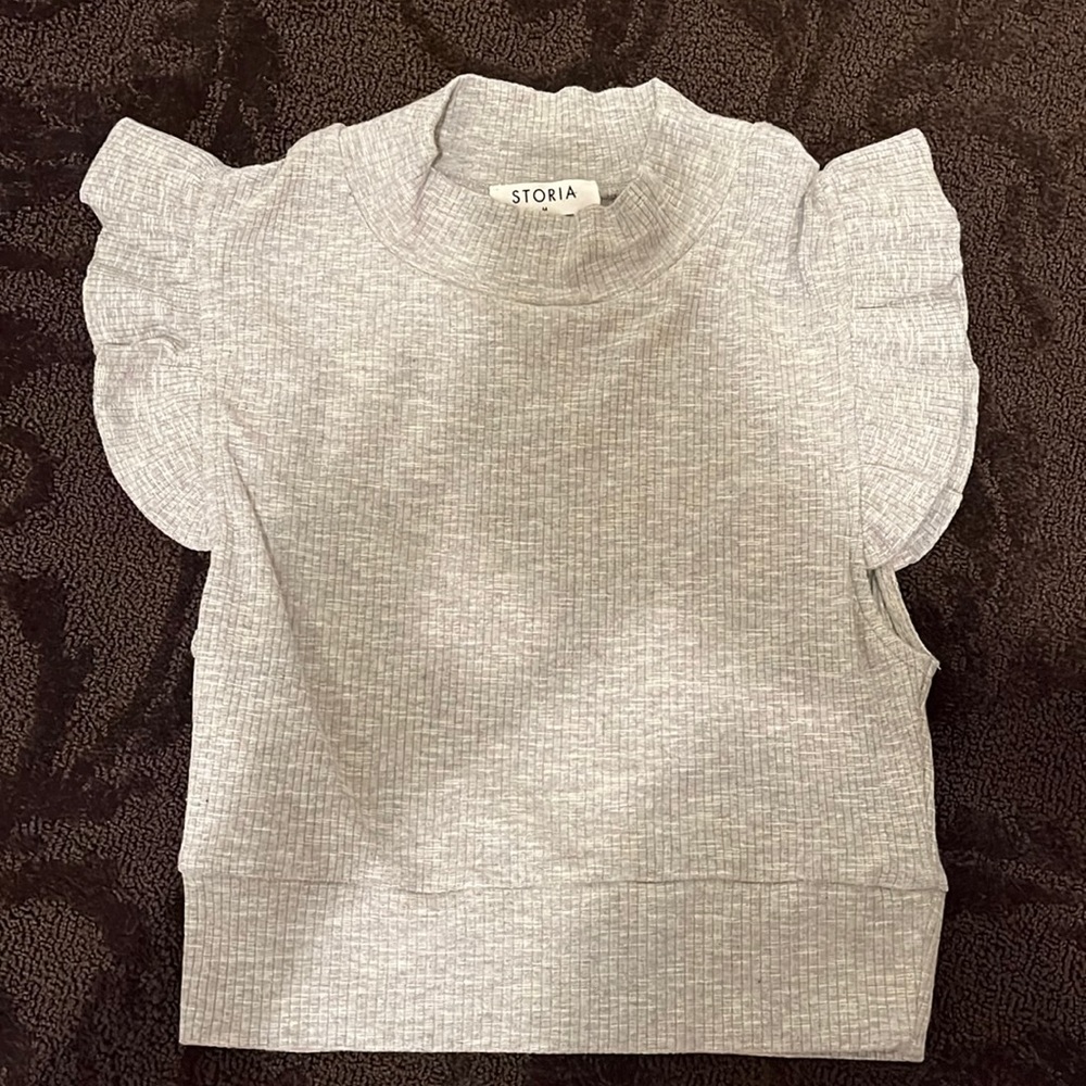 Storia: Gray tank